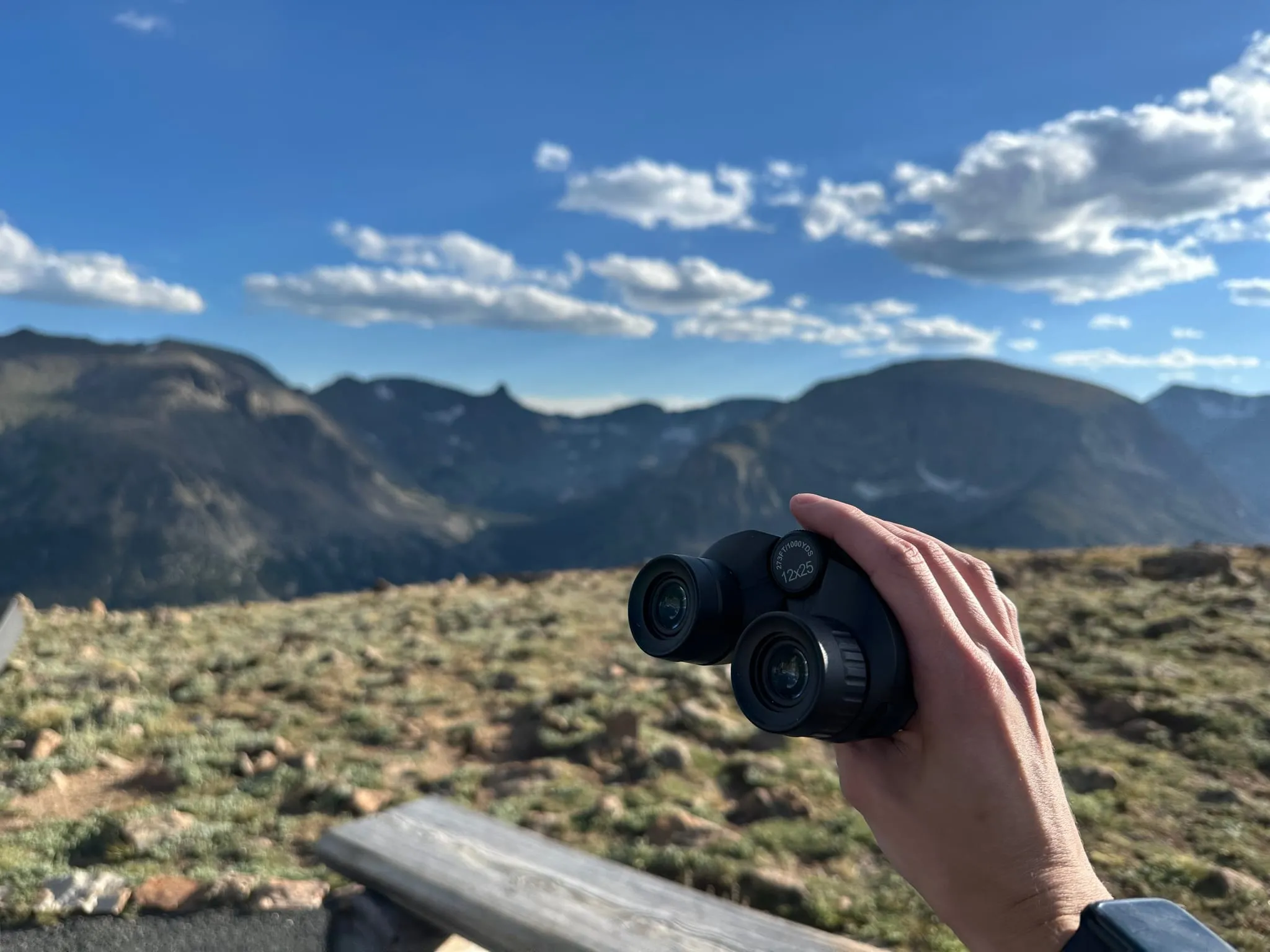 Binoculars held over the tundra on Trail Ridge Road