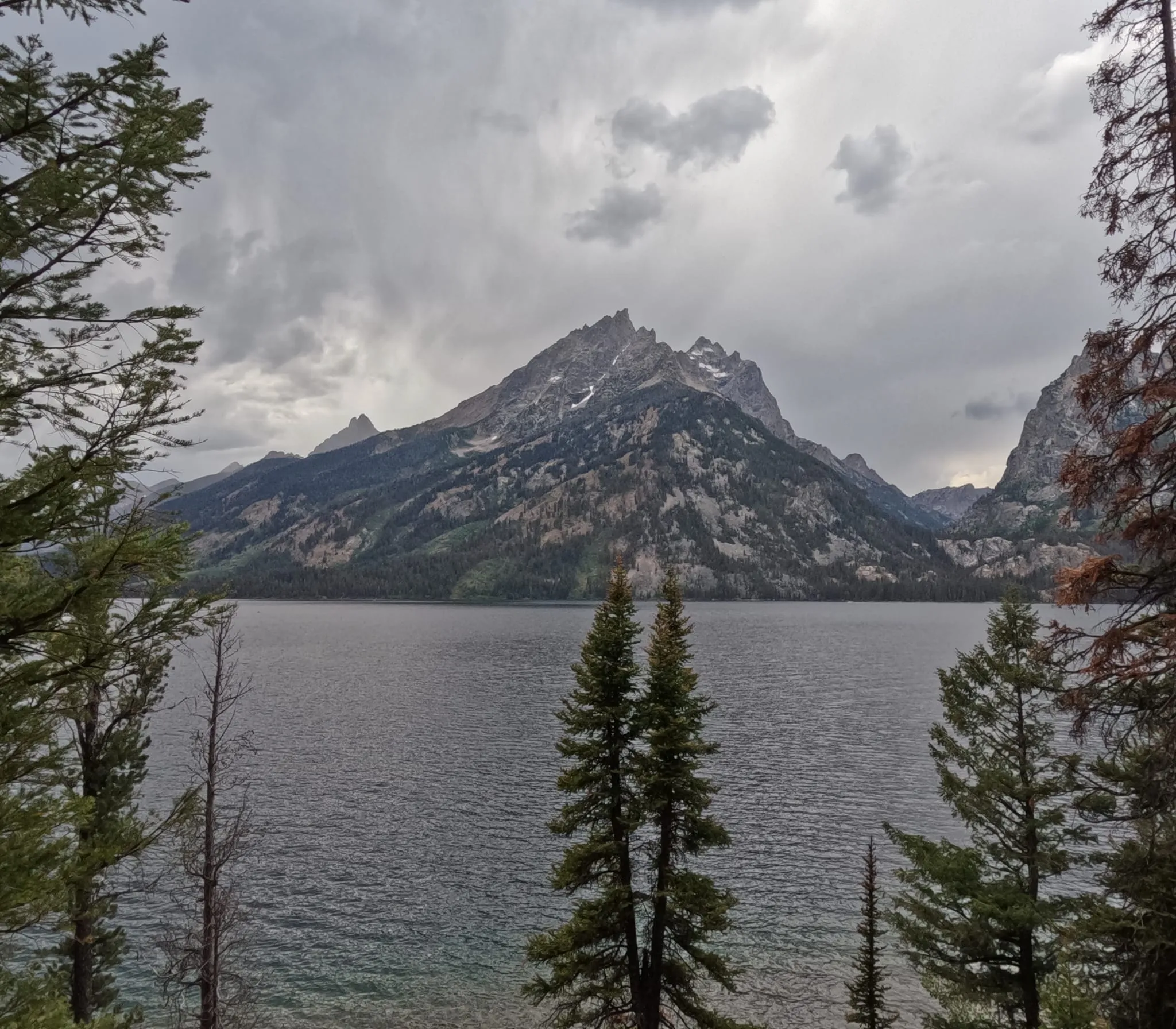 Jenny Lake under the Tetons on a cloudy day