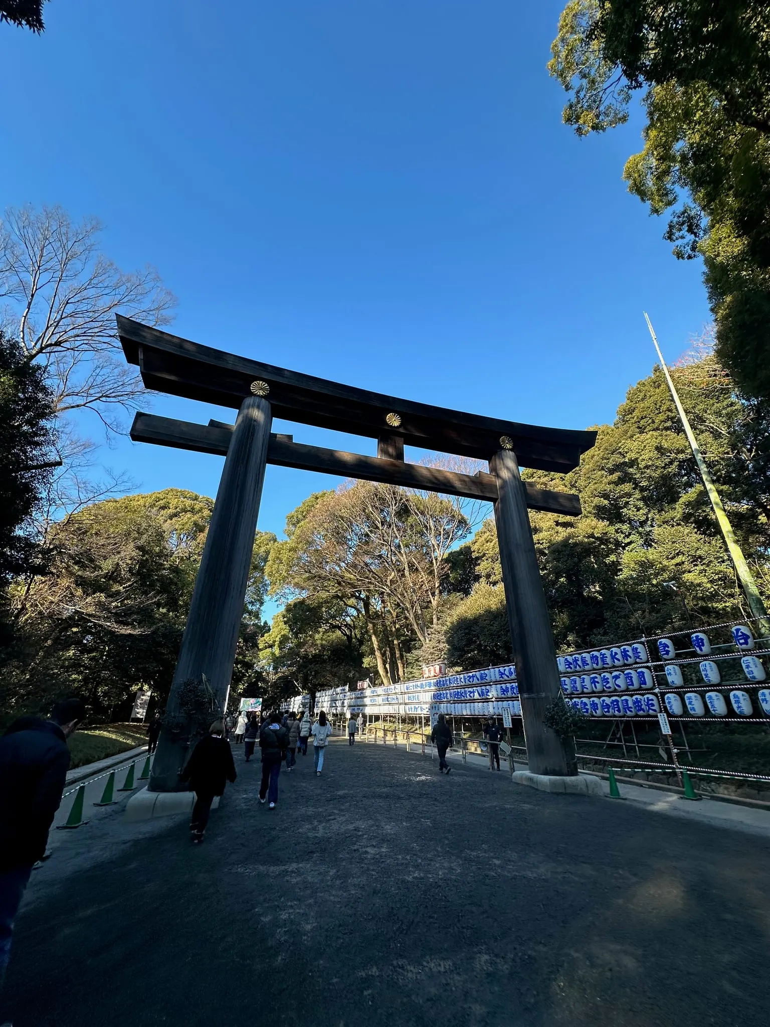 A large dark torii gate at a shrine in Tokyo